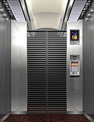 Кабина лифта Mitsubishi с сенсорными экранами (фото с сайта mitsubishi-elevator.com)